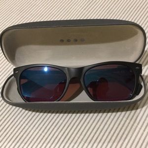 Color blindness corrective lenses. Enchroma Ellis. Shaded for outdoor.